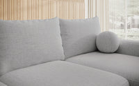 Kampinė sofa LIVA, pilkas šenilas, su kamuoliuku