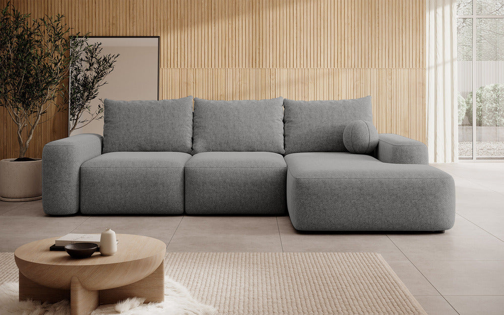 Kampinė sofa LIVA, tamsiai pilkas šenilas, su kamuoliuku