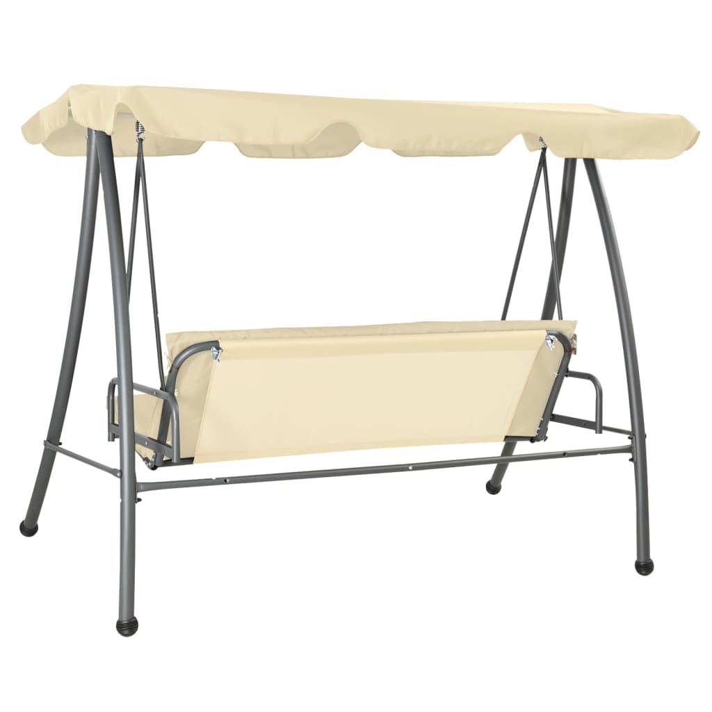Outdoor swing with a canopy, sand and white