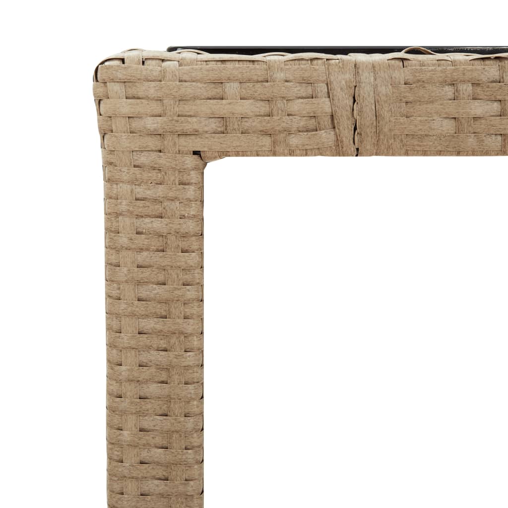 Table with a glass top, sand, poly rattan and glass