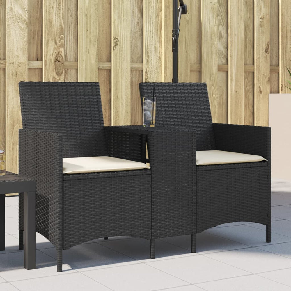 Two-seater garden sofa with table and cushions, black