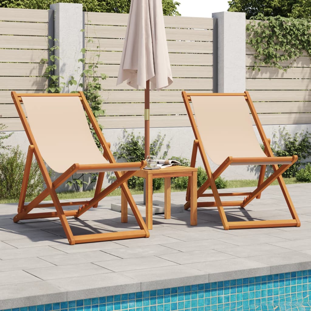 Foldable beach chair, sand, eucalyptus and fabric