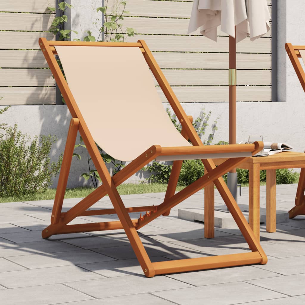 Foldable beach chair, sand, eucalyptus and fabric