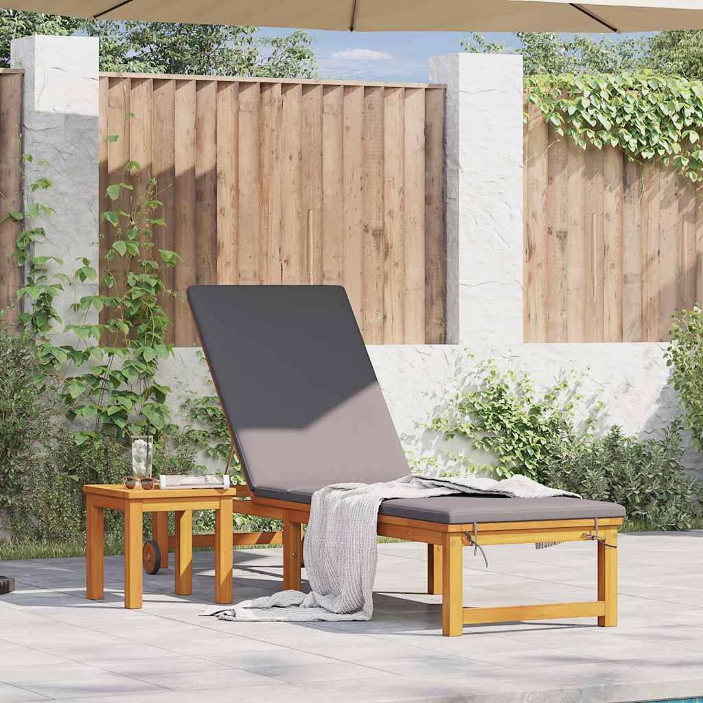 Sun lounger with light grey cushions, made from solid acacia wood.