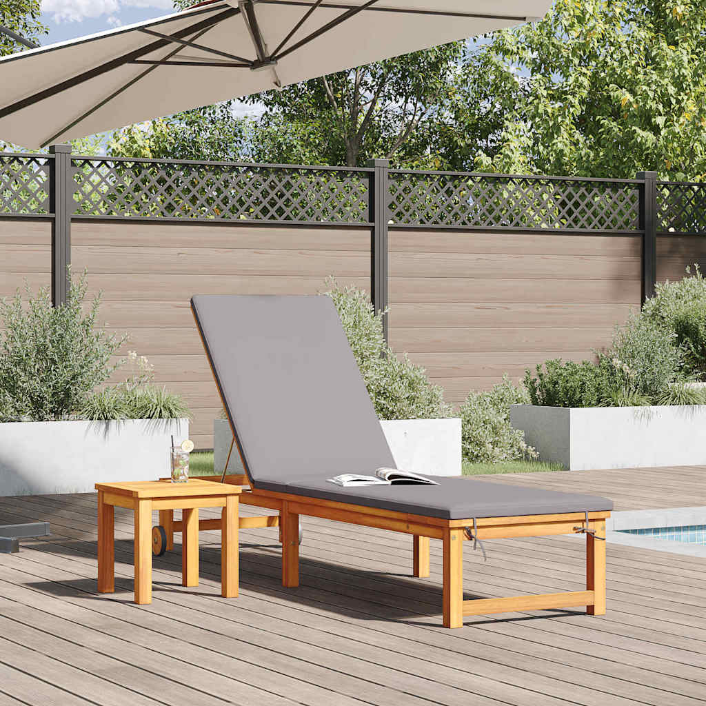 Sun lounger with light grey cushions, made from solid acacia wood.