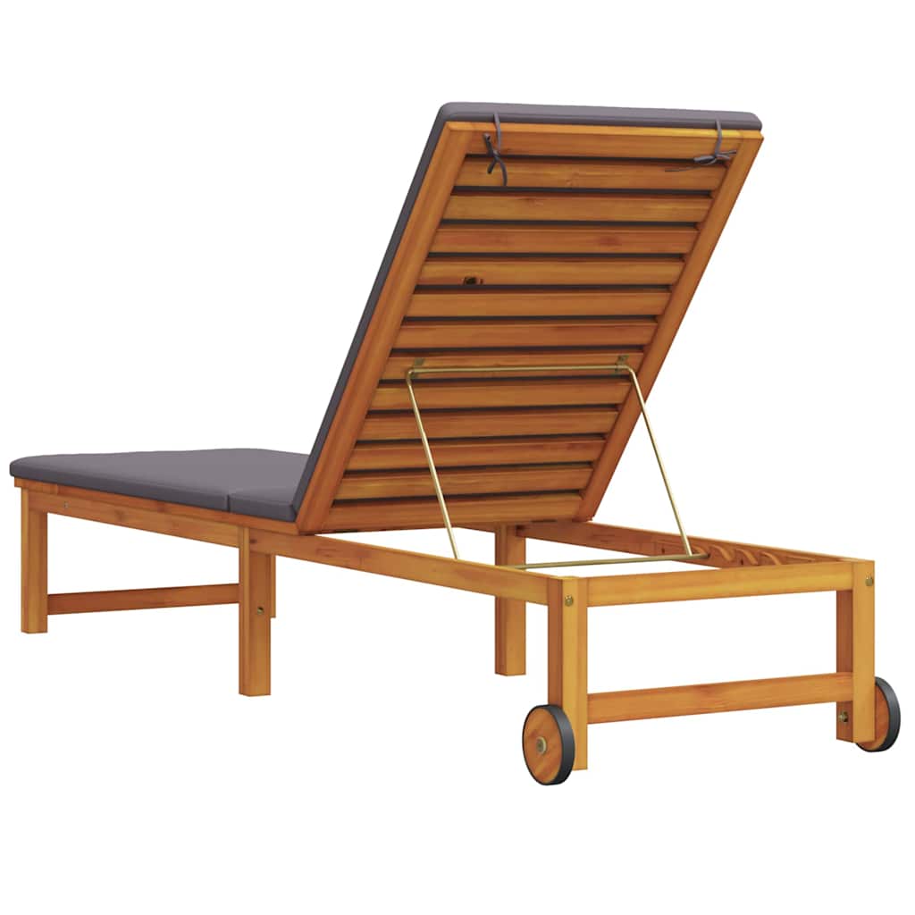 Sun lounger with light grey cushions, made from solid acacia wood.