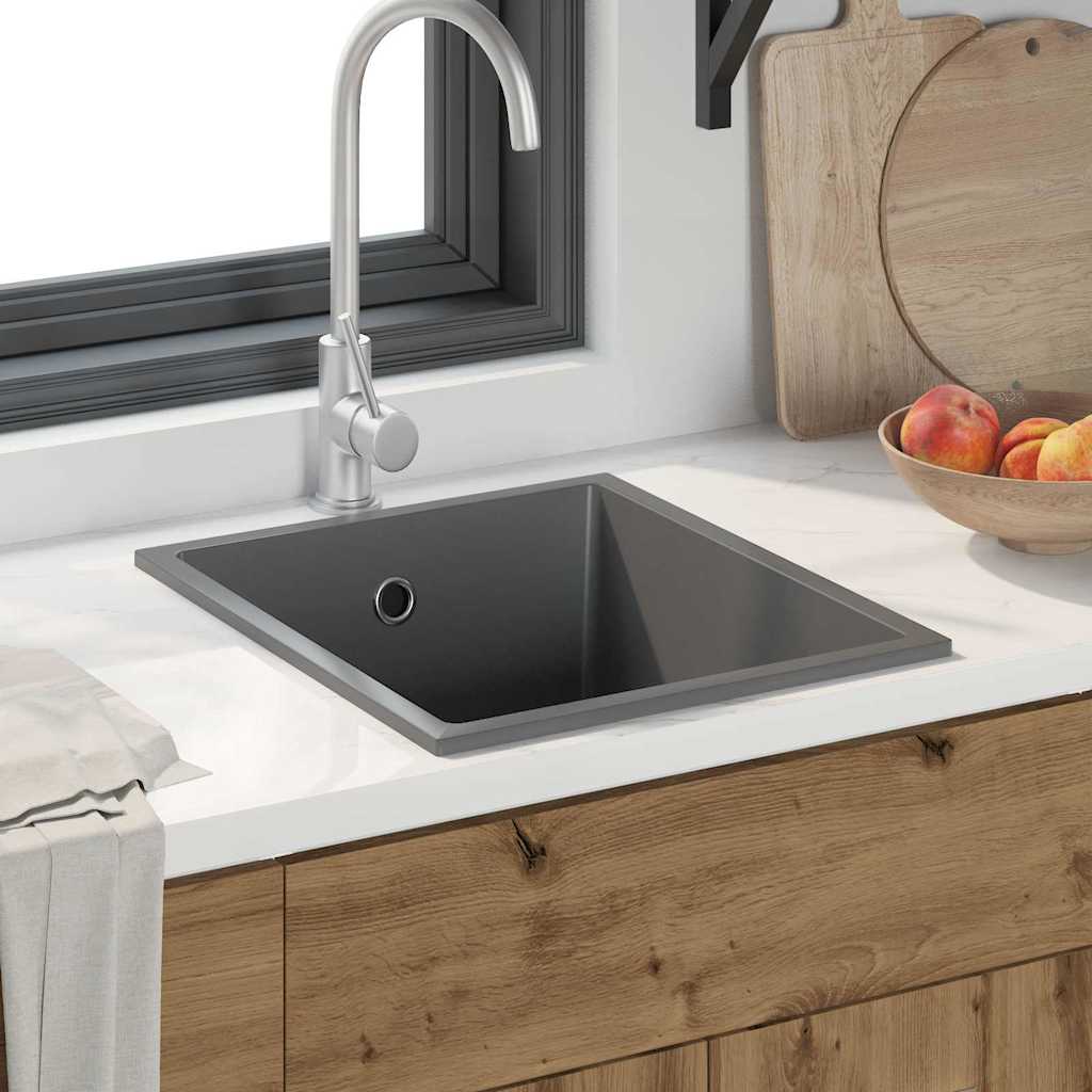 kitchen sink with overflow hole in grey granite