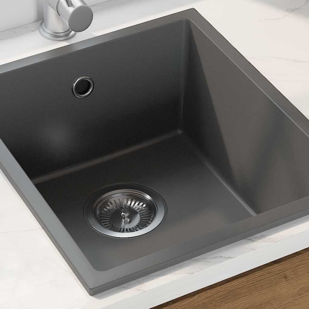 kitchen sink with overflow hole in grey granite