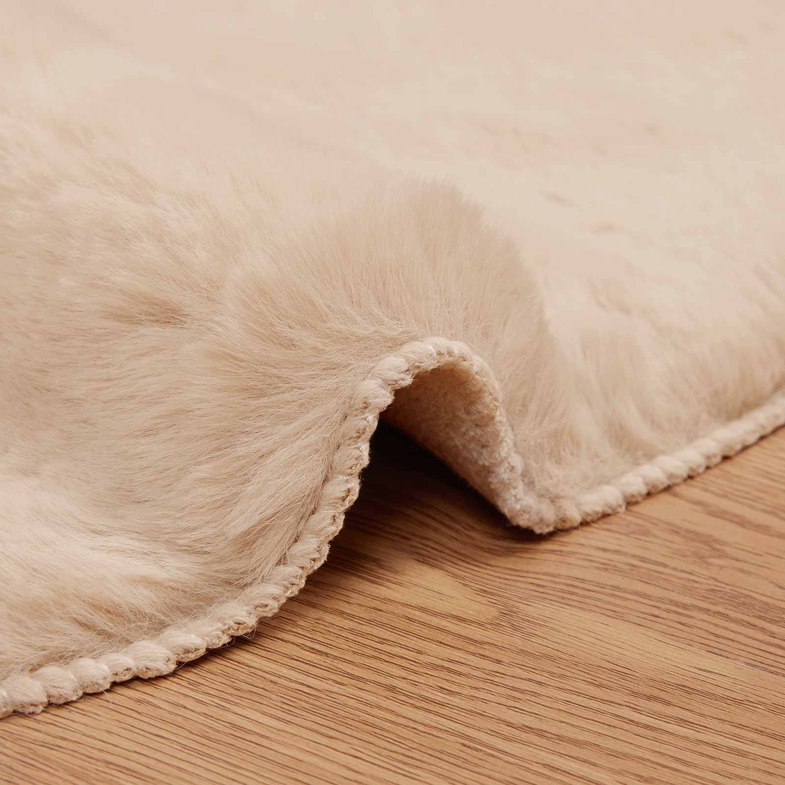 Dirbtinio triušio kailio kilimas Olite Taupe Ø 120 cm