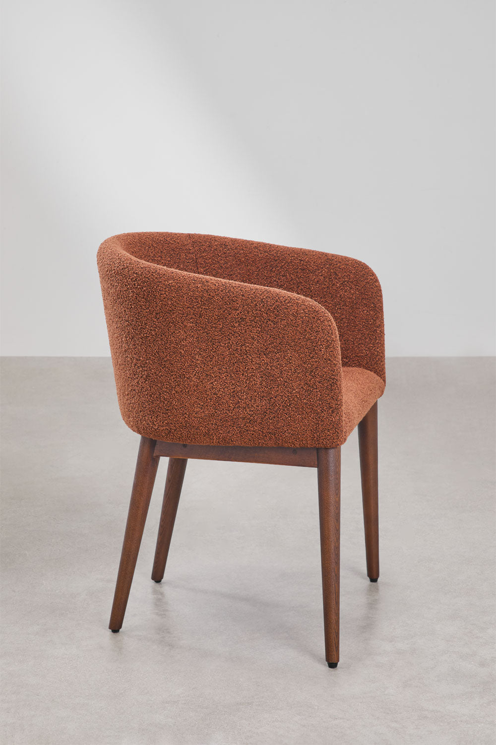Dining chair SOLUARO with armrests, dark wood frame, brick red bouclé