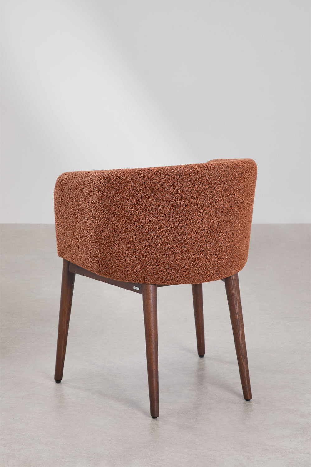 Dining chair SOLUARO with armrests, dark wood frame, brick red bouclé