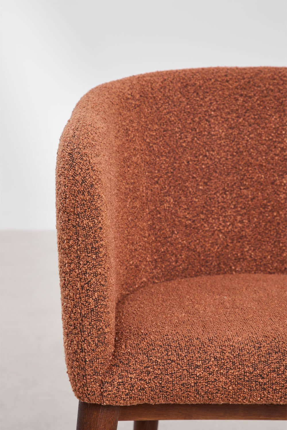 Dining chair SOLUARO with armrests, dark wood frame, brick red bouclé