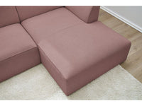Rožinė kampinė sofa MEGEVE be porankių moderniame interjere
