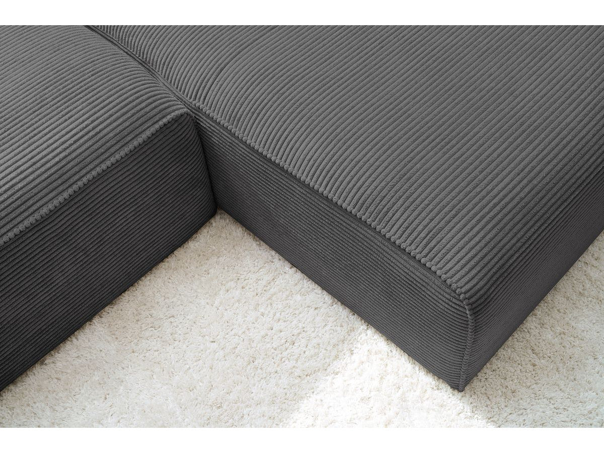 Kampinė sofa MEGEVE veliūrinė tamsiai pilka minimalistinio dizaino kambaryje