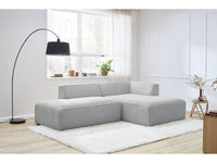 Kampinė sofa MEGEVE veliūrinė šviesiai pilka su švelnia tekstūra iš arti