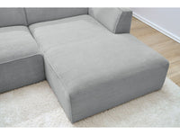 Kampinė sofa MEGEVE veliūrinė šviesiai pilka minimalistinio dizaino kambaryje