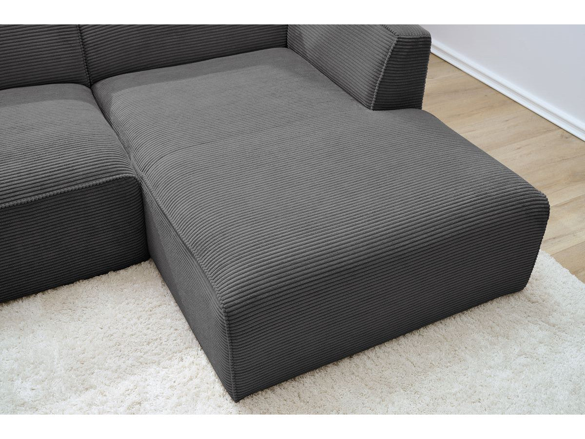 Kampinė sofa MEGEVE veliūrinė tamsiai pilka su minkšta sėdima dalimi