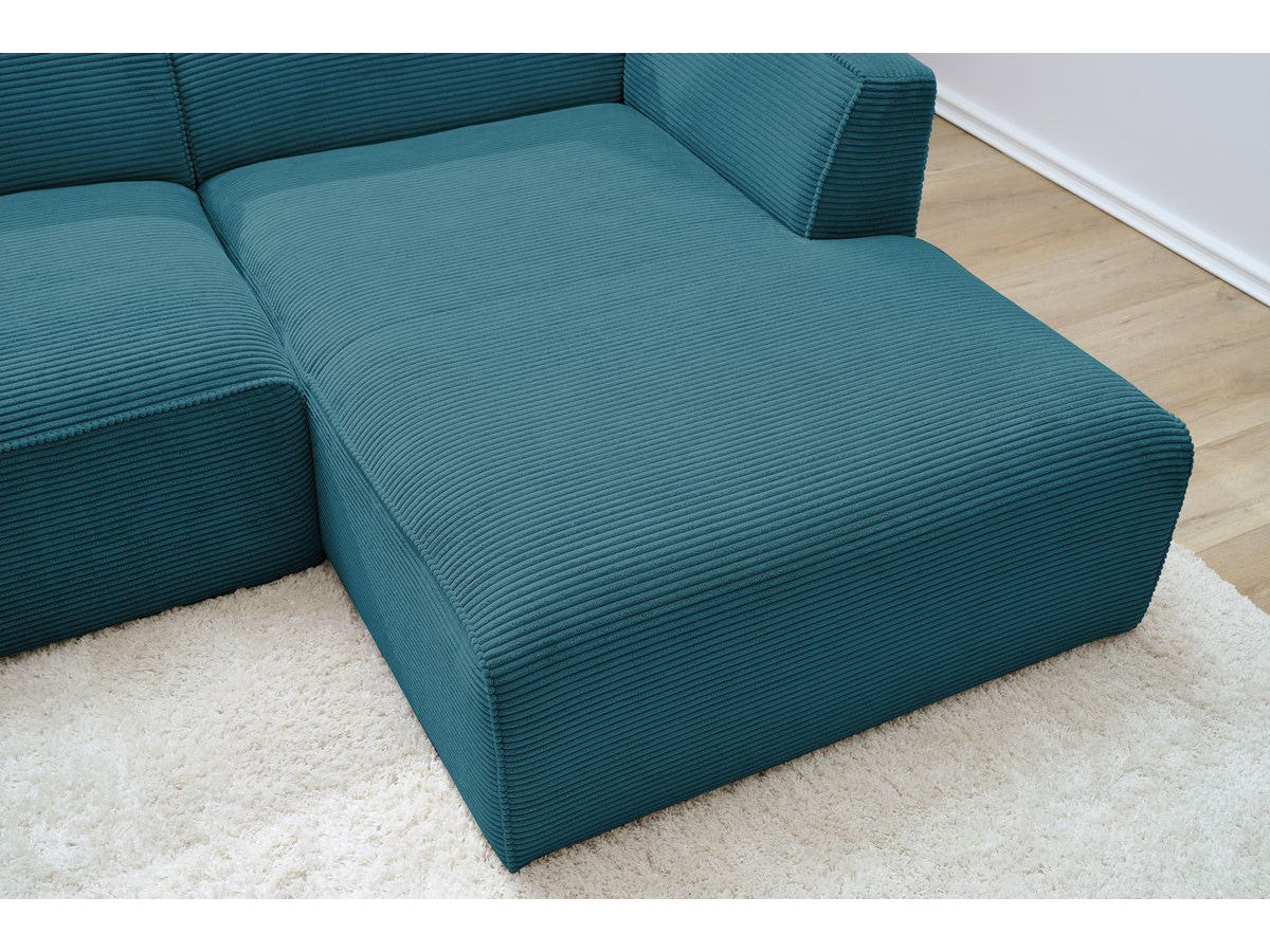 Kampinė sofa MEGEVE veliūrinė tamsiai mėlyna su minkšta sėdima dalimi