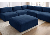 Kampinė sofa JEANNE, 4 moduliai + kampas + pufas, tamsiai mėlyna svetainės interjere