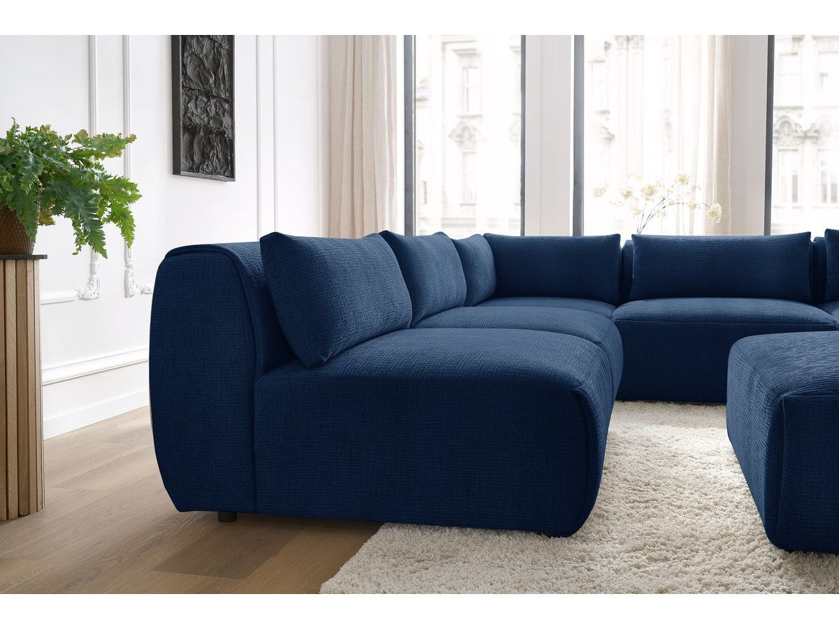 Kampinė sofa JEANNE, 4 moduliai + kampas + pufas, tamsiai mėlyna vaizdas iš šono