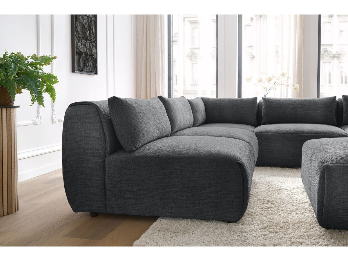 Kampinė sofa JEANNE, 4 moduliai + kampas + pufas, tamsiai pilka vaizdas iš šono