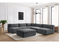 Kampinė sofa JEANNE, 4 moduliai + kampas + pufas, tamsiai pilka šalia kavos staliuko