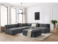 Kampinė sofa JEANNE, 4 moduliai + kampas + pufas, tamsiai pilka moderniame interjere