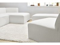 Kampinė modulinė sofa MEGEVE bouclé balta dešinė su foteliu ir pufu detalė iš arti