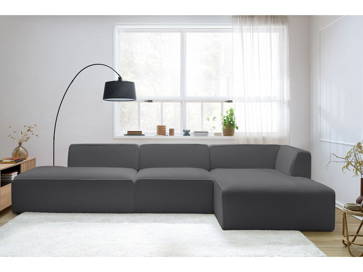 Kampinė modulinė sofa MEGEVE bouclé tamsiai pilka dešinė su foteliu ir pufu vaizdas iš šono