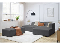 Kampinė sofa MEGEVE tamsiai pilka spalva dešininis kampas su pufu moderniame interjere