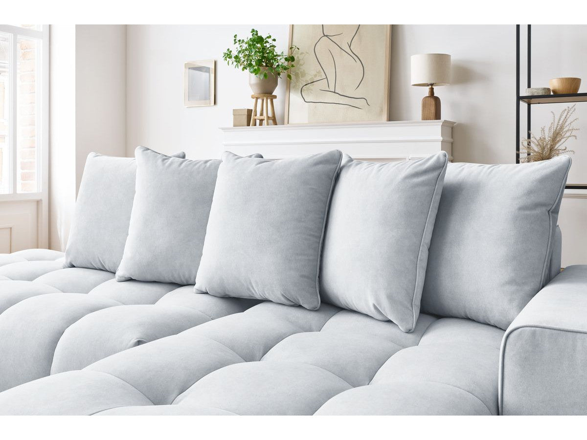 Kampinė sofa MONT-BLANC, veliūras, šviesiai pilka moderniame interjere