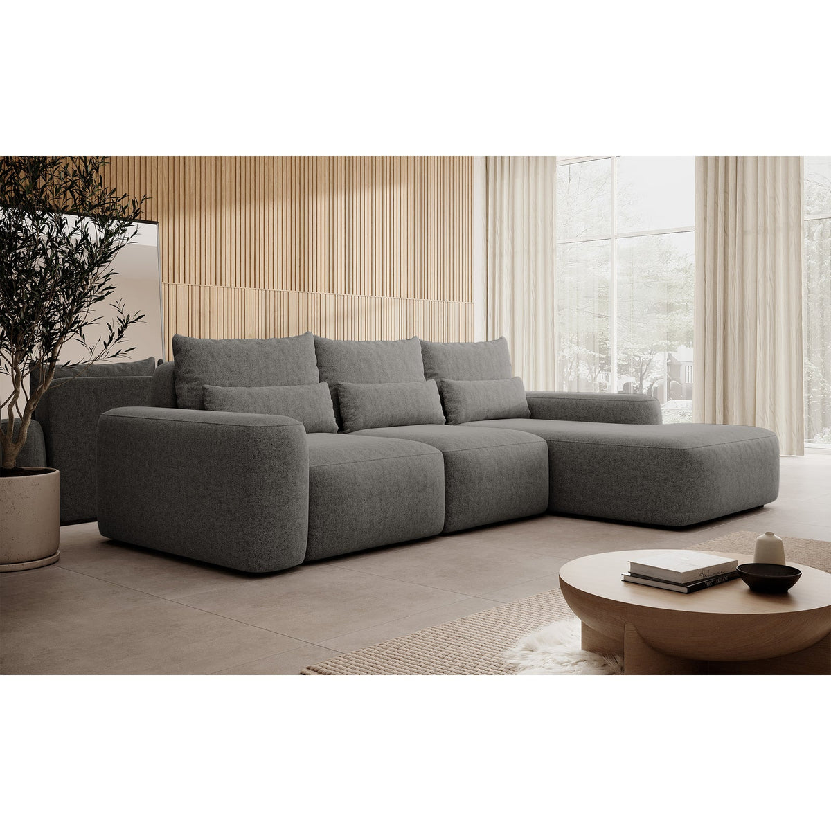 Kampinė sofa LIVA interjere su dekoro elementais