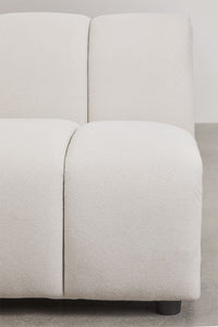 Sofa ELIOTA realioje aplinkoje boucle audinys