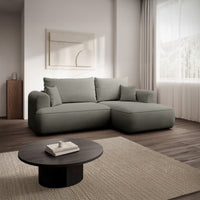 Kampinė sofa CORMAC mini interjere su dekoro elementais