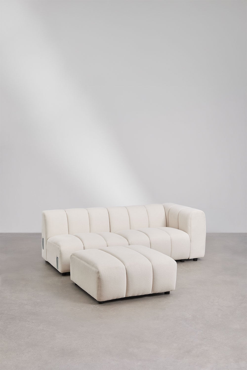 Kampinė sofa ELIOTA iš priekio boucle audinys