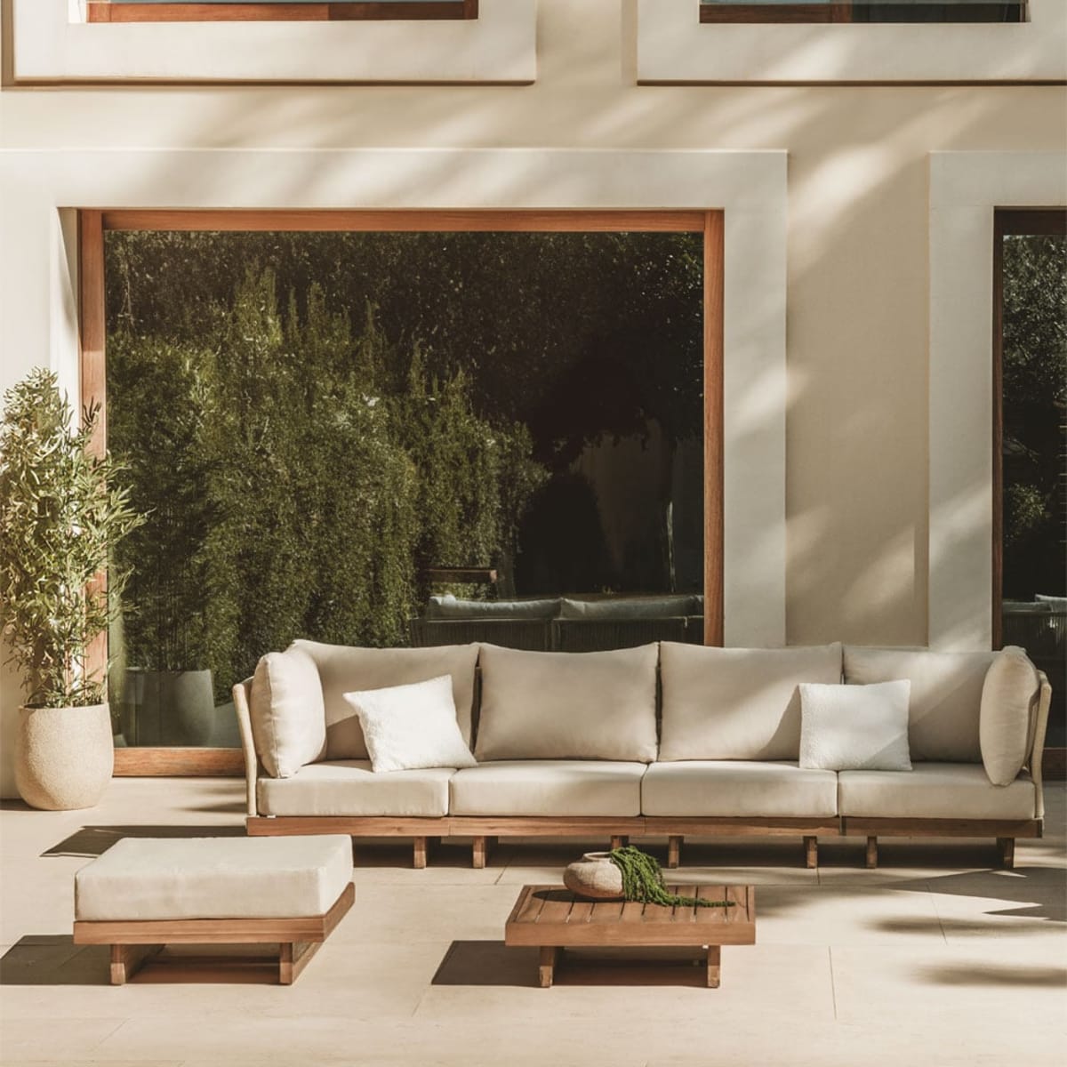 FORTO outdoor furniture set, 4-piece with a pouffe and a table